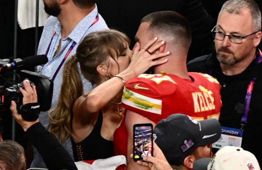 Taylor Swift and Travis Kelce kiss after Super Bowl win Feb 2024 Getty BangShowbiz