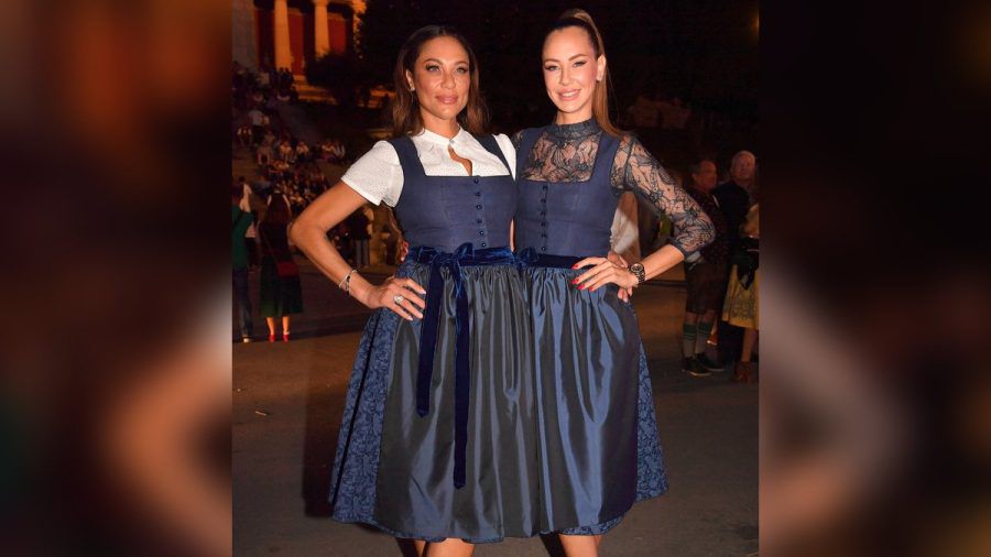 Das gleiche Dirndl mit verschiedenen Accessoires unterschiedlich gestylt: Lilly Becker und Alessandra Meyer-Wölden beim Almauftrieb auf dem Oktoberfest im letzten Jahr. (the/spot)